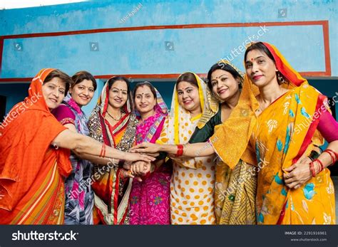 group happy young traditional indian women stock photo