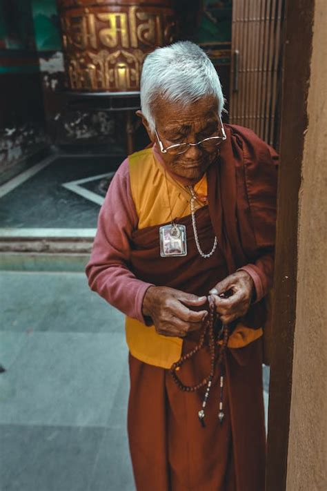 Monk Praying in Temple · Free Stock Photo