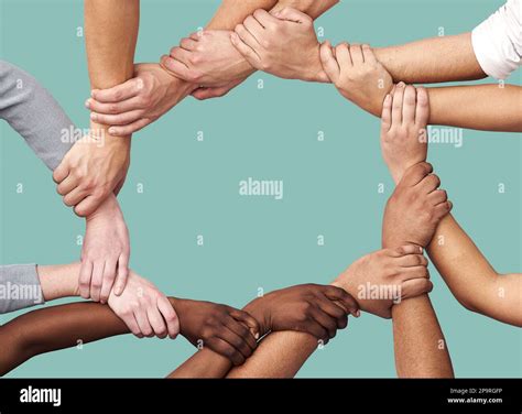 teamwork holding hands