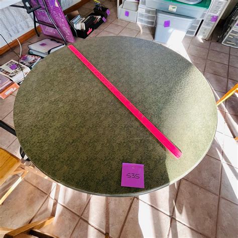 Folding Round Card Table | EstateSales.org