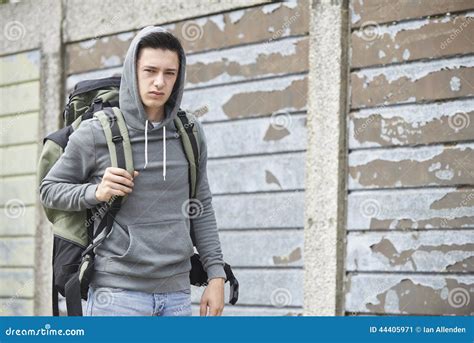 Homeless Teenage Boy On Street With Rucksack Stock Image - Image: 44405971