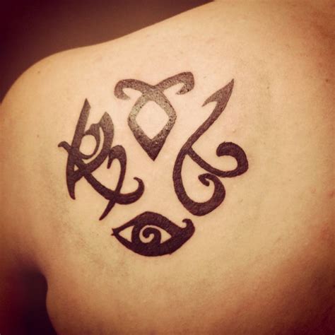 Pin by Sceona Gress on Tattoo ideas | Rune tattoo, Symbolic tattoos ...