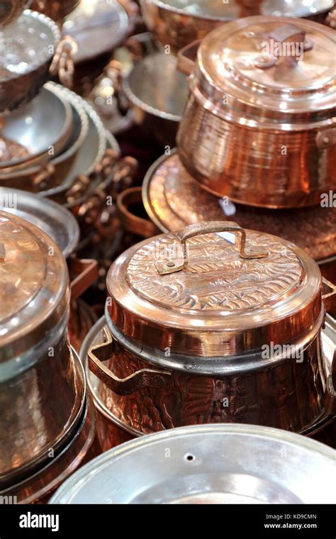 shiny copper cookware comprising pots pans soucepans picture