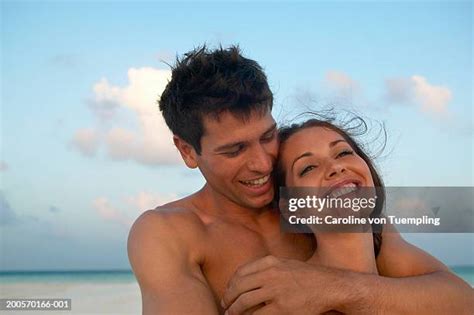 nudity beach stock  high res pictures  images getty