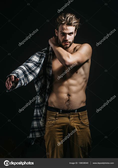 Sexy naked man wear shirt Stock Photo by ©Tverdohlib.com 138038040
