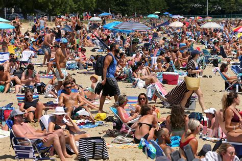 Photos: Some social distancing, but mostly crowds as people flock to