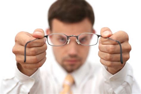 Does Wearing Glasses Make Eyes Look Smaller? - The Eye News