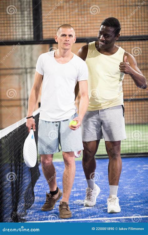 Male Padel Players Handshake After Win A Padel Match In Blue Paddel Court Indoor Royalty-Free ...