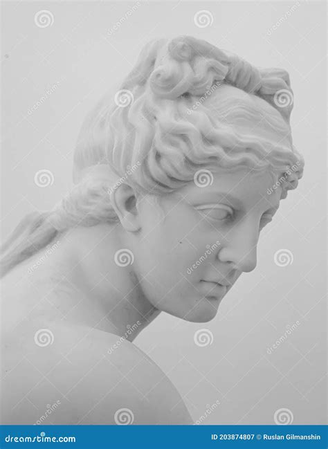 White Marble Sculpture Head Of Young Woman. Statue Of Sensual