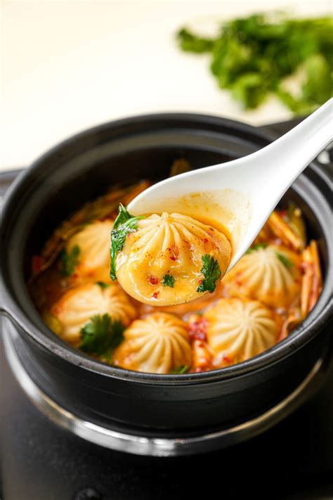 Soup Dumplings in Tom Yum Sauce - One Happy Bite