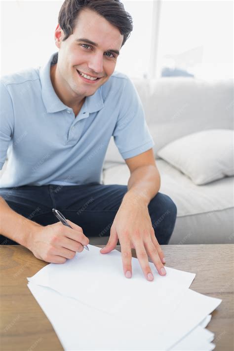 premium photo portrait   handsome man writing   paper