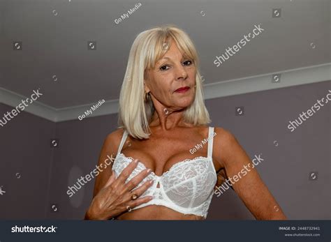 Sexy Older Woman Lingerie Royalty-Free Images, Stock Photos & Pictures