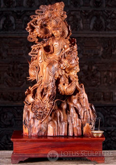 Kwan Yin on Dragon: Serene Hand-carved Wood Deity of Compassion