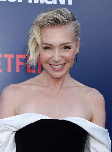 Download Portia De Rossi Smilingat Event Wallpaper | Wallpapers.com