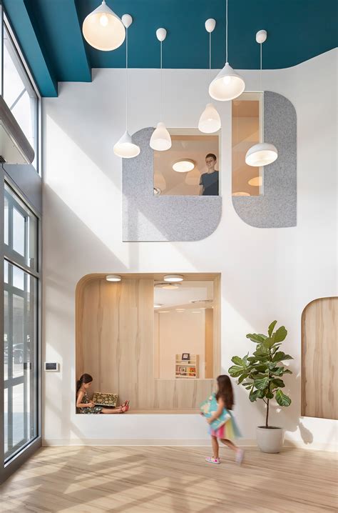 BAAO Architects completes City Kids Education Center with deep carved