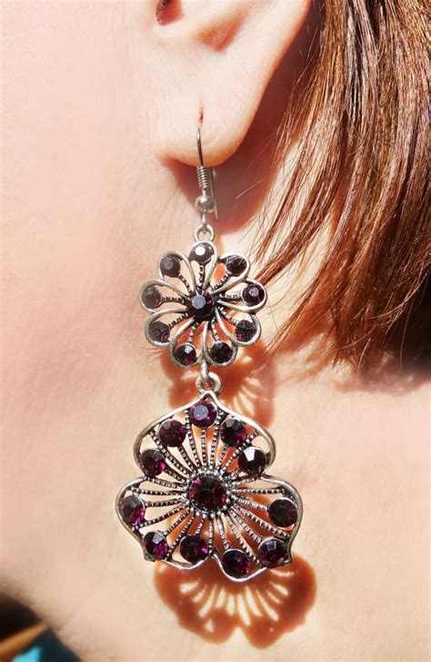 earrings jewellery  bright crystals  ear stock photo image