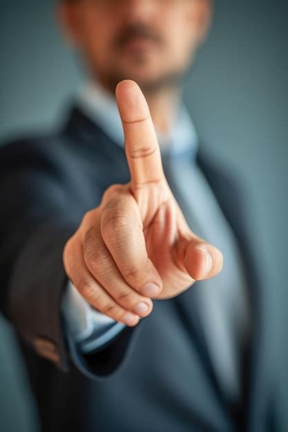 businessman pointing  premium ai generated image