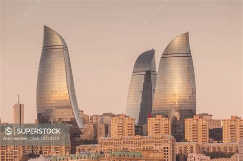 Azerbaijan, Baku, city skyline with Flame Towers form Baku Bay, dawn ...