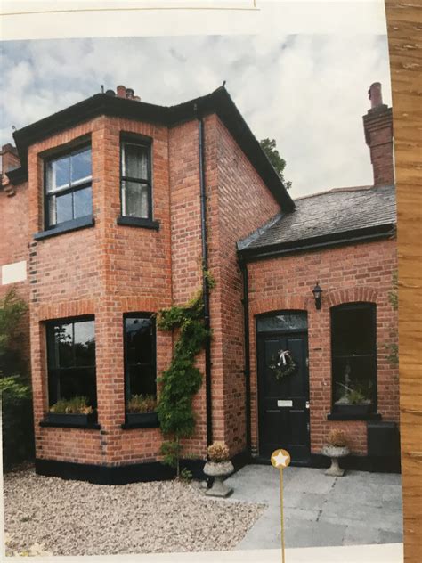 Luxury Brick House with Black Window Frames