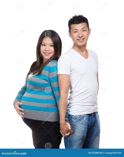 Asian Pregnant Couple Holding Hand Stock Photo - Image of happiness