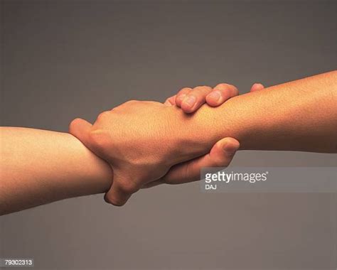 Hand Grabbing Wrist Photos and Premium High Res Pictures - Getty Images