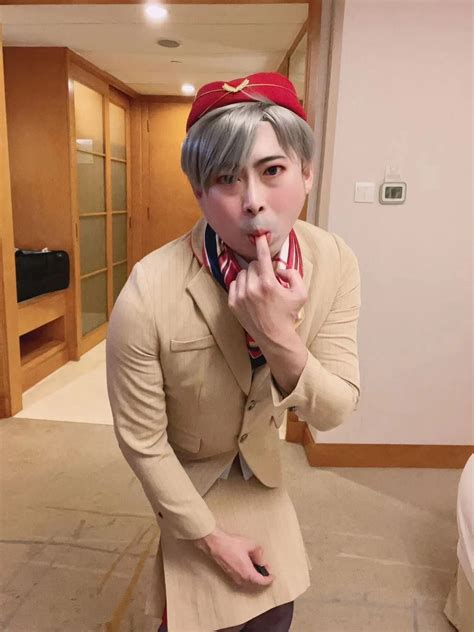 Asian femboy sissy in Emirates flight attendant dress - 21 Pics | xHamster