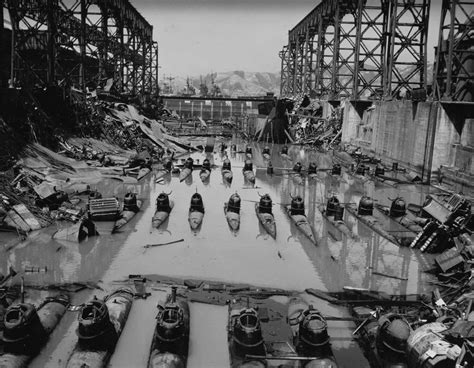 Japanese Type D (Koryu) midget submarines in a partially flooded
