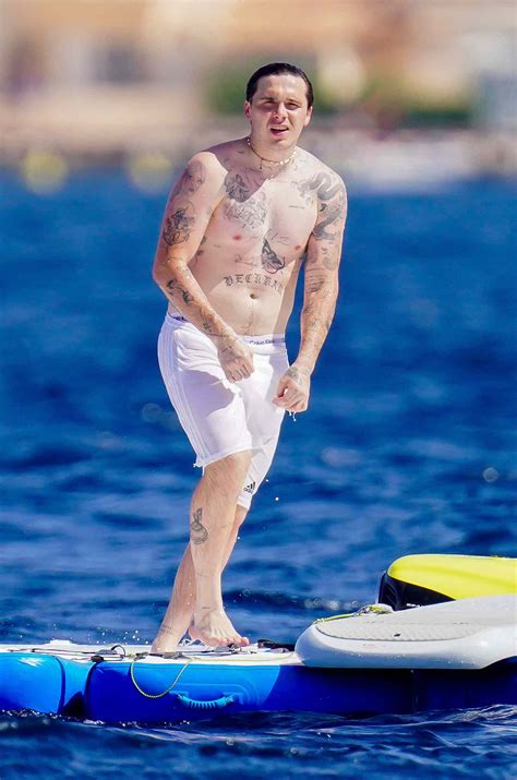 Shirtless Brooklyn Beckham Jumps Off Yacht While Vacationing with