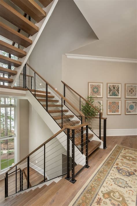 Tour this inviting home soaking in unforgettable views of Lake Keowee