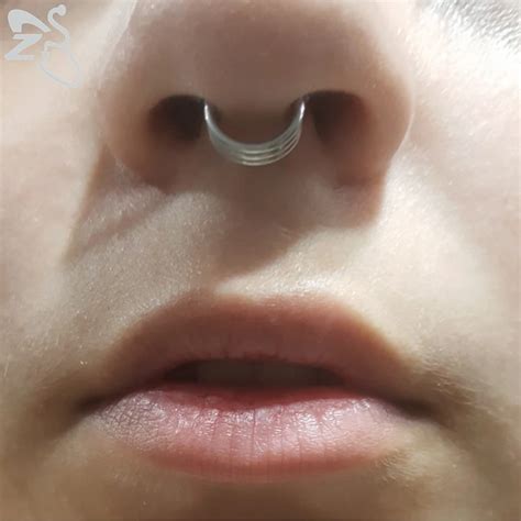 saddle nose  septum piercing