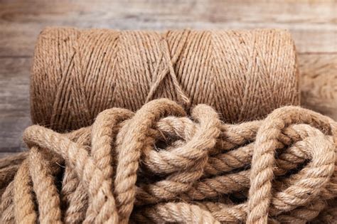 premium photo  coil  thin manila rope   bunch  thick rope