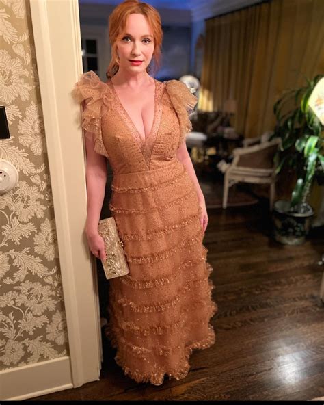 Christina Hendricks, 48, rocks sheer plunging gown as she shows off her ...