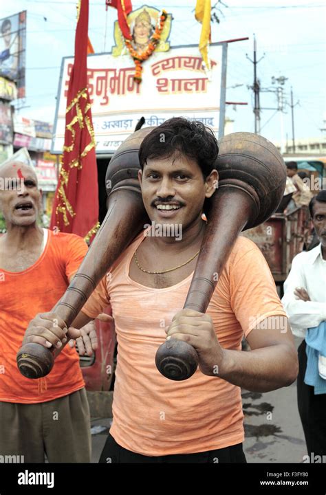 Janmashtami festival lord Krishna birthday celebration carnival man feeling displaying strength ...