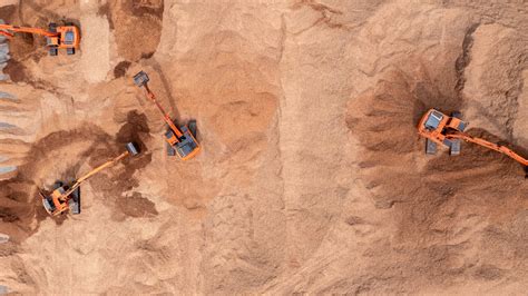 aerial view road motor grader flatting dirt road surface motor grader