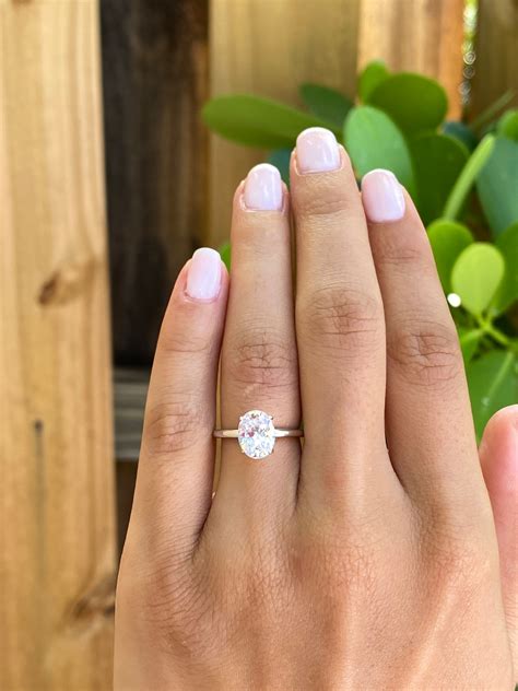 2 Carats Oval Engagement Ring. Sterling Silver Diamond Simulant ...