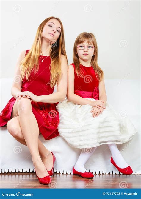 Mother and Daughter Posing Together Stock Image - Image of glasses