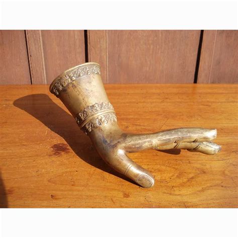 memi metal hand  antique hut