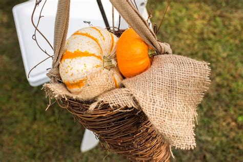 Cornucopia Aisle Markers Filled with Pumpkins
