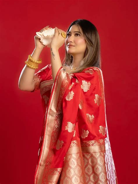 sampurna lahiri glows   stunning red saree ensemble