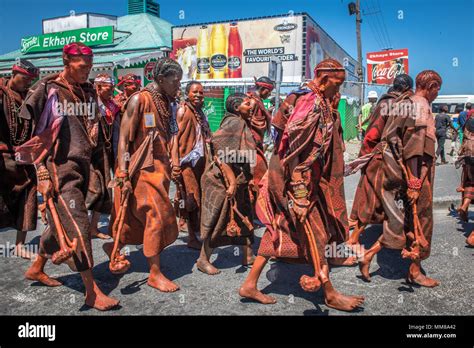 Group of Basotho men walking through a township as part of a circumcision ceremony Stock Photo ...