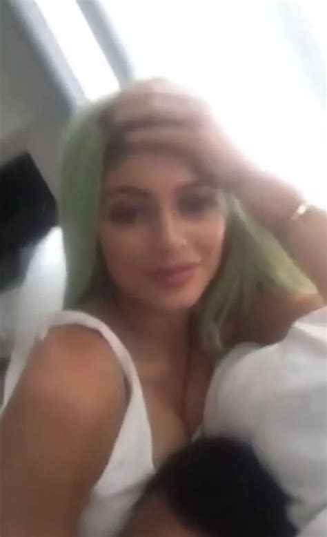 Tyga puts head in Kylie Jenner's cleavage as they get racy in playful