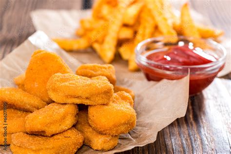 Chicken Nuggets with French Fries Stock Photo | Adobe Stock