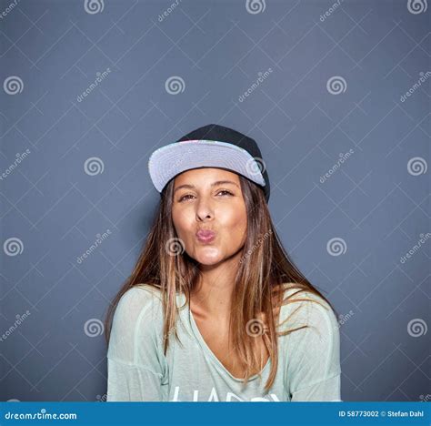 Lively Woman Kissing at the Camera Stock Photo - Image of mouth