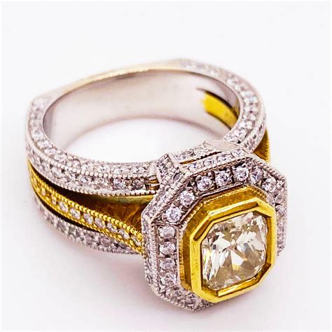 1.50 ct Fancy Yellow Radiant Diamond Ring, 18 Karat Gold 3.00 Carat
