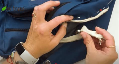 how to put a zipper back on backpack