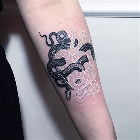 Black and white snake tattoo - Tattoogrid.net