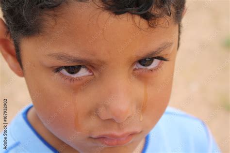 Sad boy crying Stock Photo | Adobe Stock