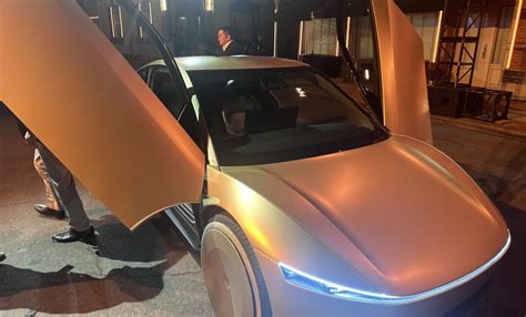 tesla model  launch speculations gene munster