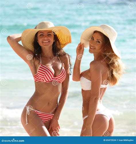 Female friends on vacation stock photo. Image of laughing - 65473534 