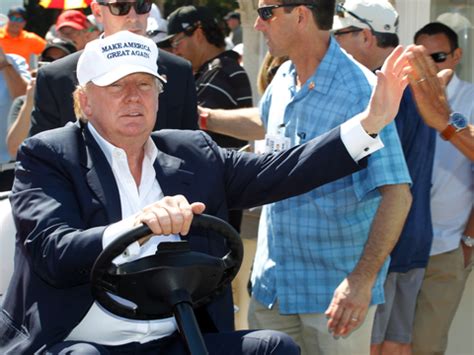 Donald Trump drives golf cart on green - Business Insider